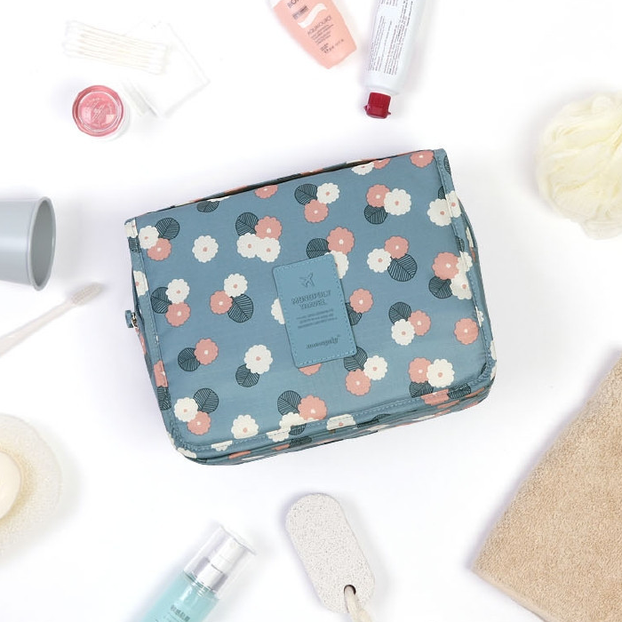 Trousse de toilette à suspendre: pliable, matelassée et imperméable