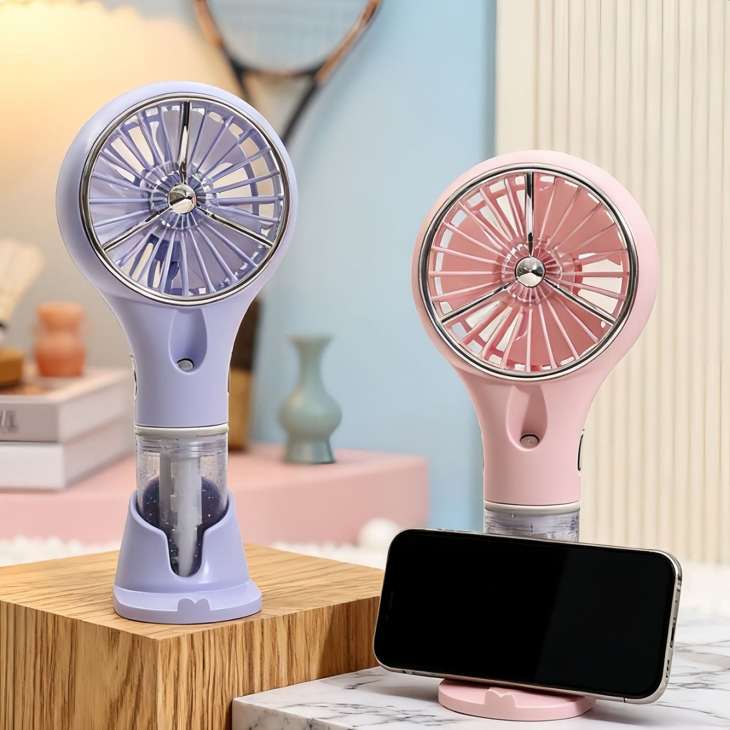 Ventilateur à main brumisateur portable unisexe avec fonction de charge USB et design ergonomique