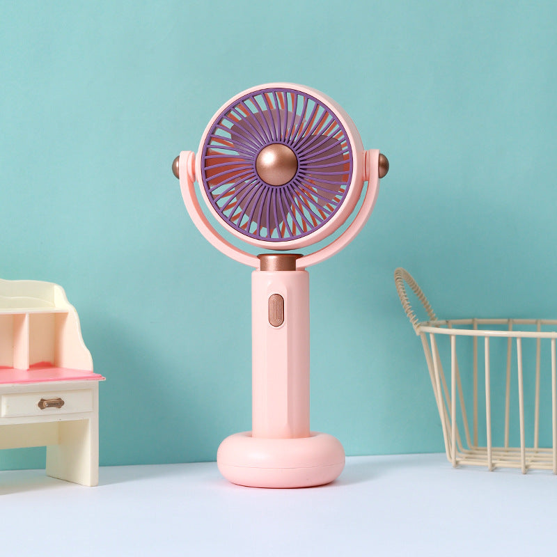 Ventilateur à main portable au design ergonomique pour femme
