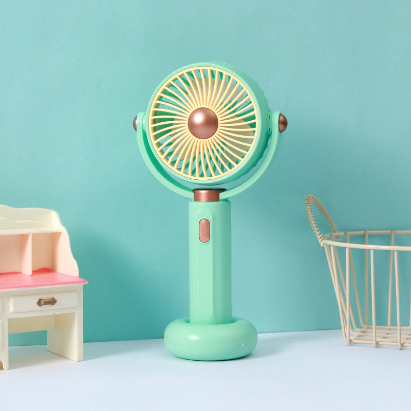 Ventilateur à main portable au design ergonomique pour femme