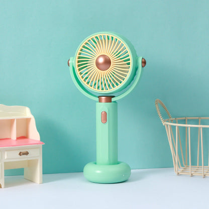 Ventilateur à main portable au design ergonomique pour femme