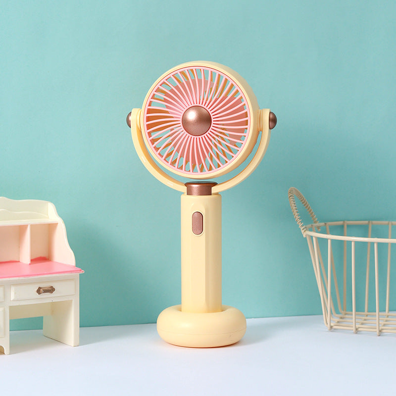 Ventilateur à main portable au design ergonomique pour femme