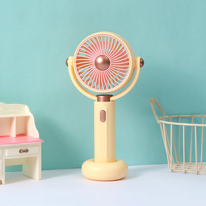 Ventilateur à main portable au design ergonomique pour femme