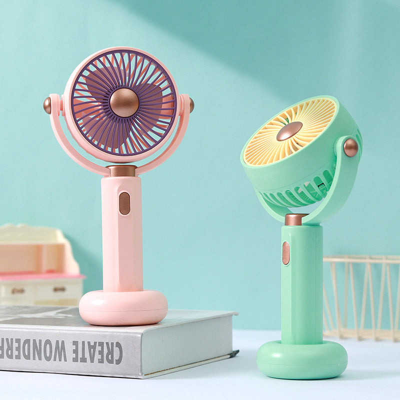 Ventilateur à main portable au design ergonomique pour femme