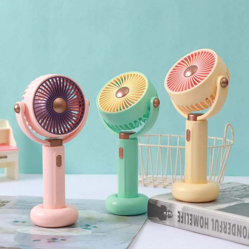 Ventilateur à main portable au design ergonomique pour femme